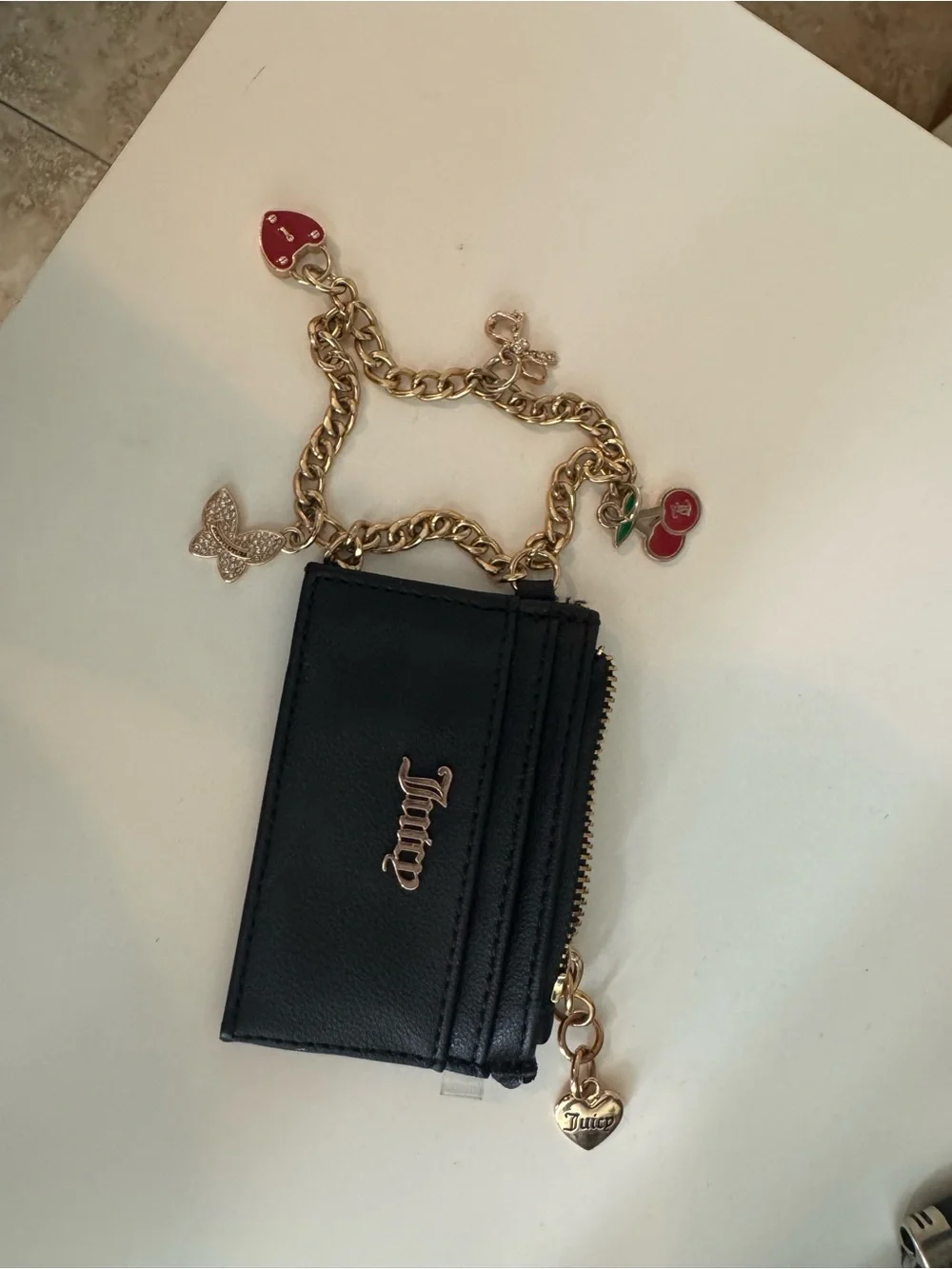 Juicy Couture Black Card Case with Gold Charm Chain and Red Charms